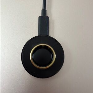 Oura ring, gold, size 11, with charger